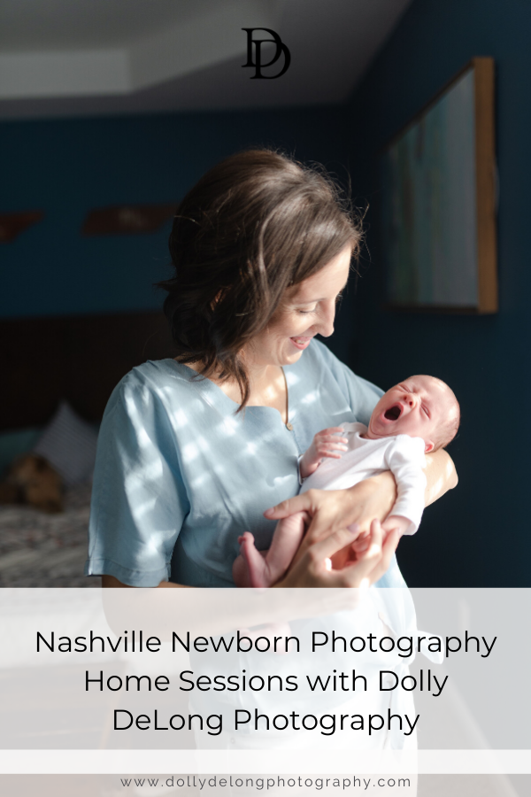 Nashville Newborn Home Session of a mom and daughter standing by a window with natural light 