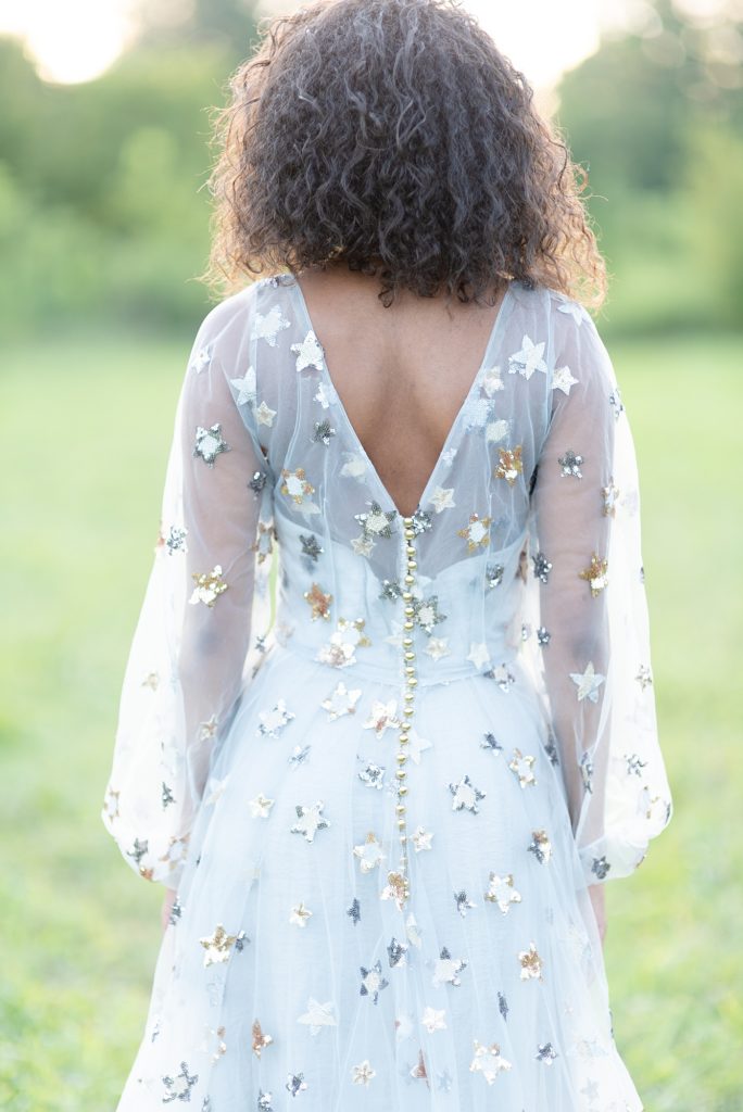 african american woman wearing a gorgeous stardust dress in the evening in Nashville TN photography by Dolly DeLong Photography