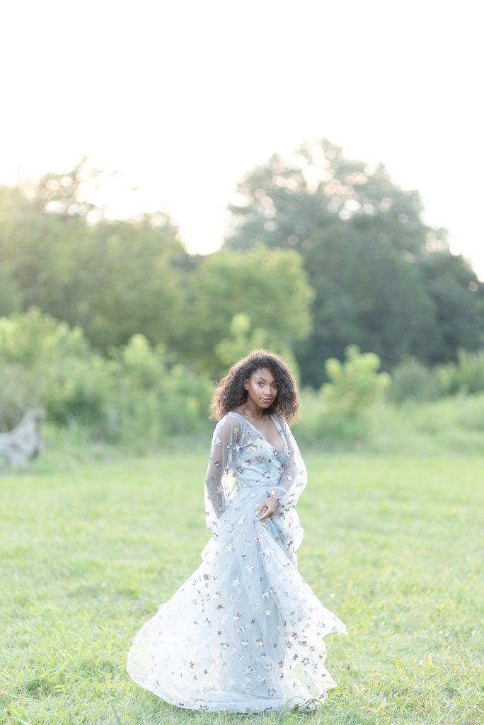 african american woman wearing a gorgeous stardust dress in the evening in Nashville TN photography by Dolly DeLong Photography