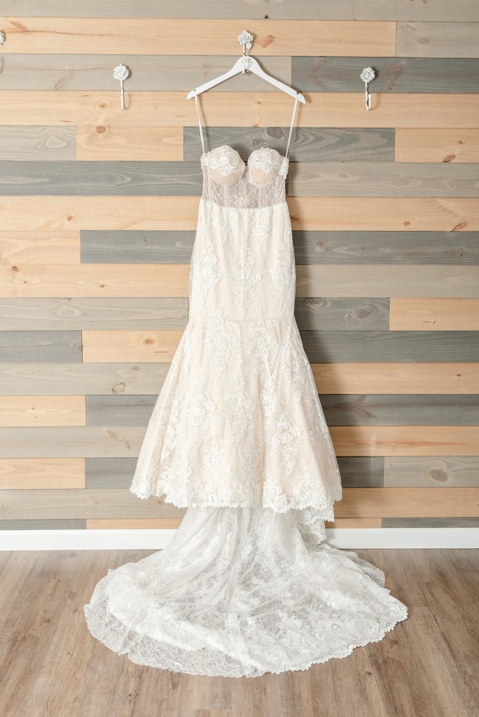a wedding dress for wedding day details by Dolly deLong Photography