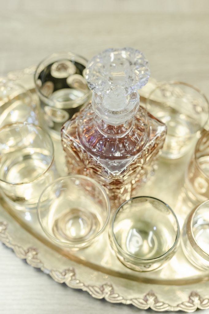 wedding day details of groomsmen room of whisky glasses for a southern wedding in Nashville