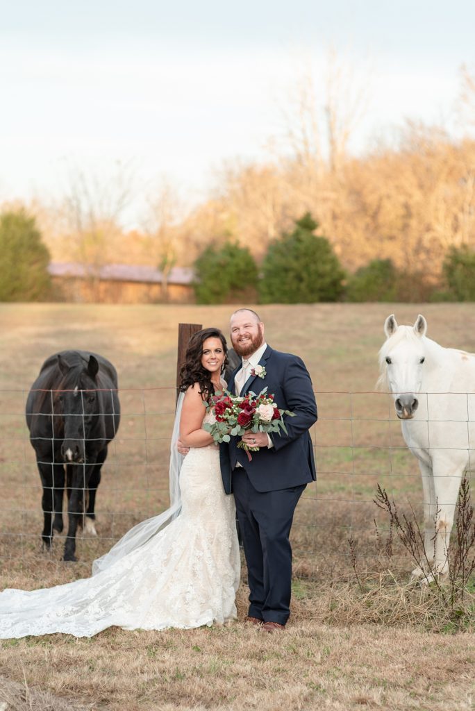 bride and groom portraits with horses on a southern farm for a Nashville Tennessee Wedding