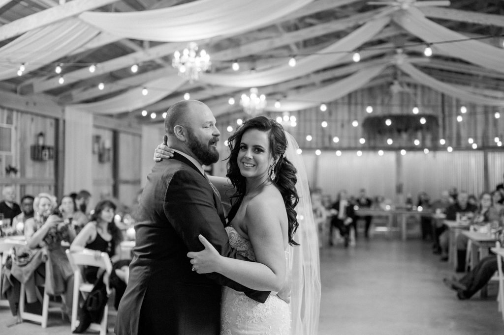 a black and white portrait of a husband and wife dancing for their first dance in Nashville