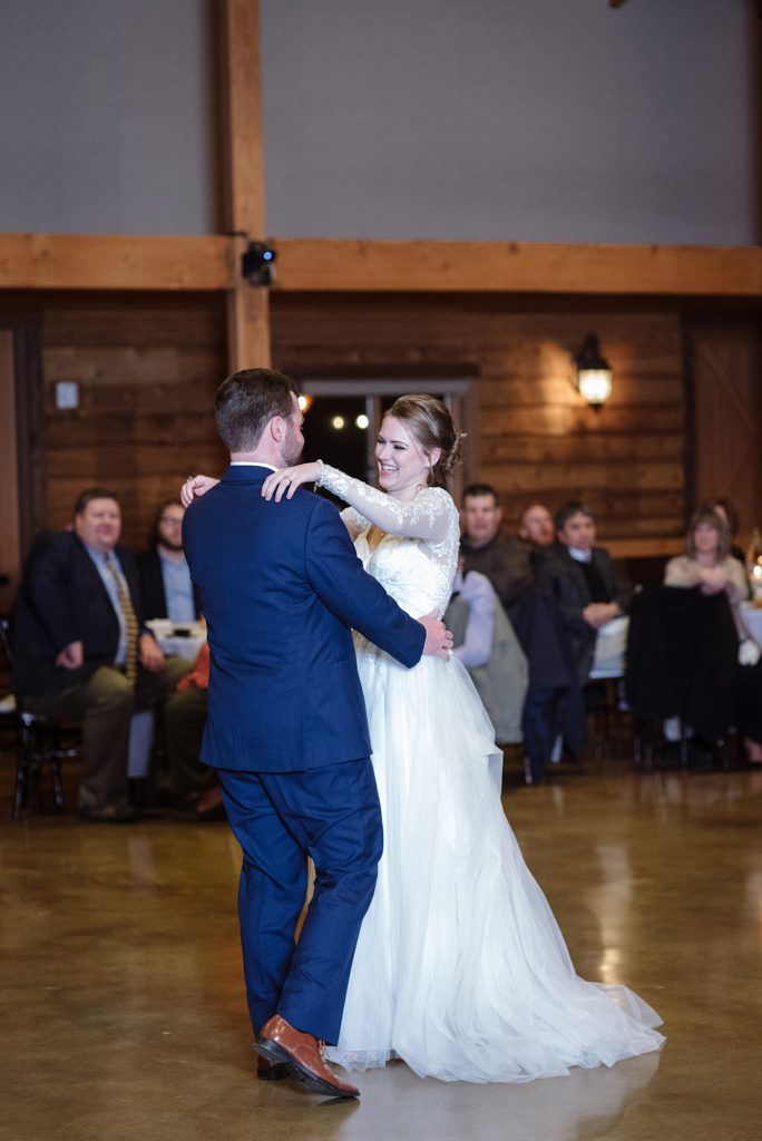 husband and wife have their first dance at the Barn at Sycamore Farms in Arrington Tennessee by Dolly DeLong Photography