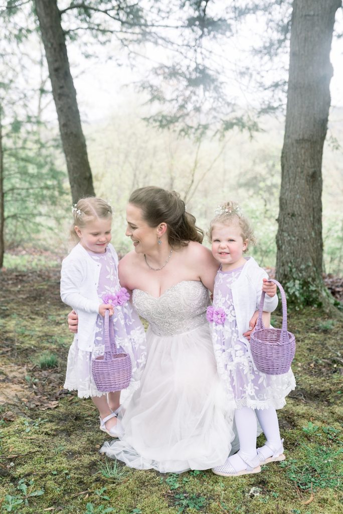 A bride with two flower girls in Lansing, West Virginia by Dolly DeLong Photography