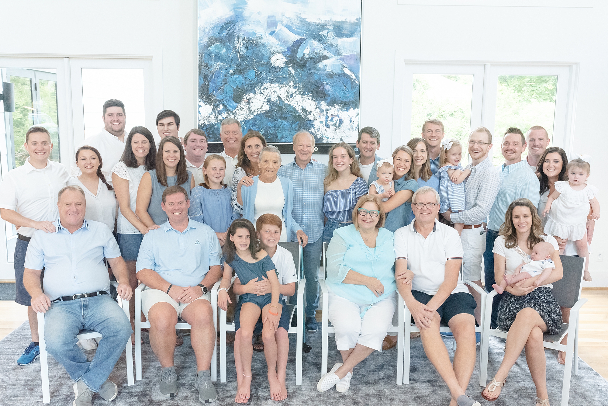 large family portrait featuring a celebration of a grandmother's 88th birthday