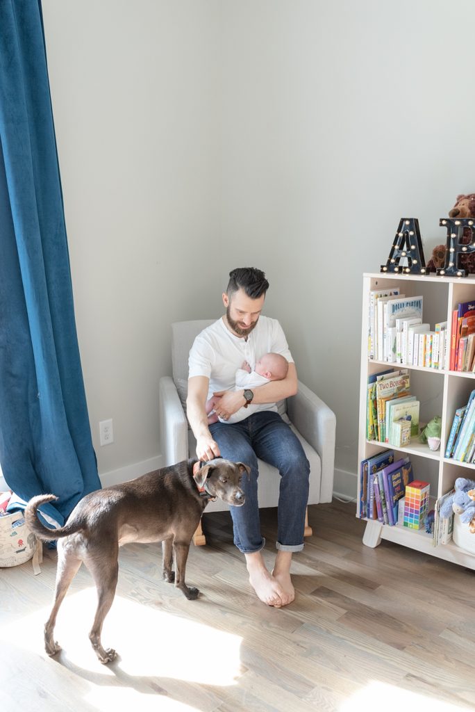 a bright and airy nashville newborn home photography session in East Nashville with Dolly DeLong Photography featuring a young couple and their sweet baby boy