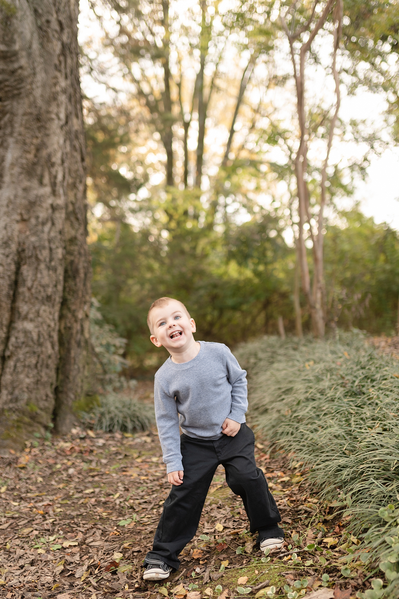 Little Boy being silly for the camera for family photos at historic stone hall in Nashville TN by Dolly DeLong Photography