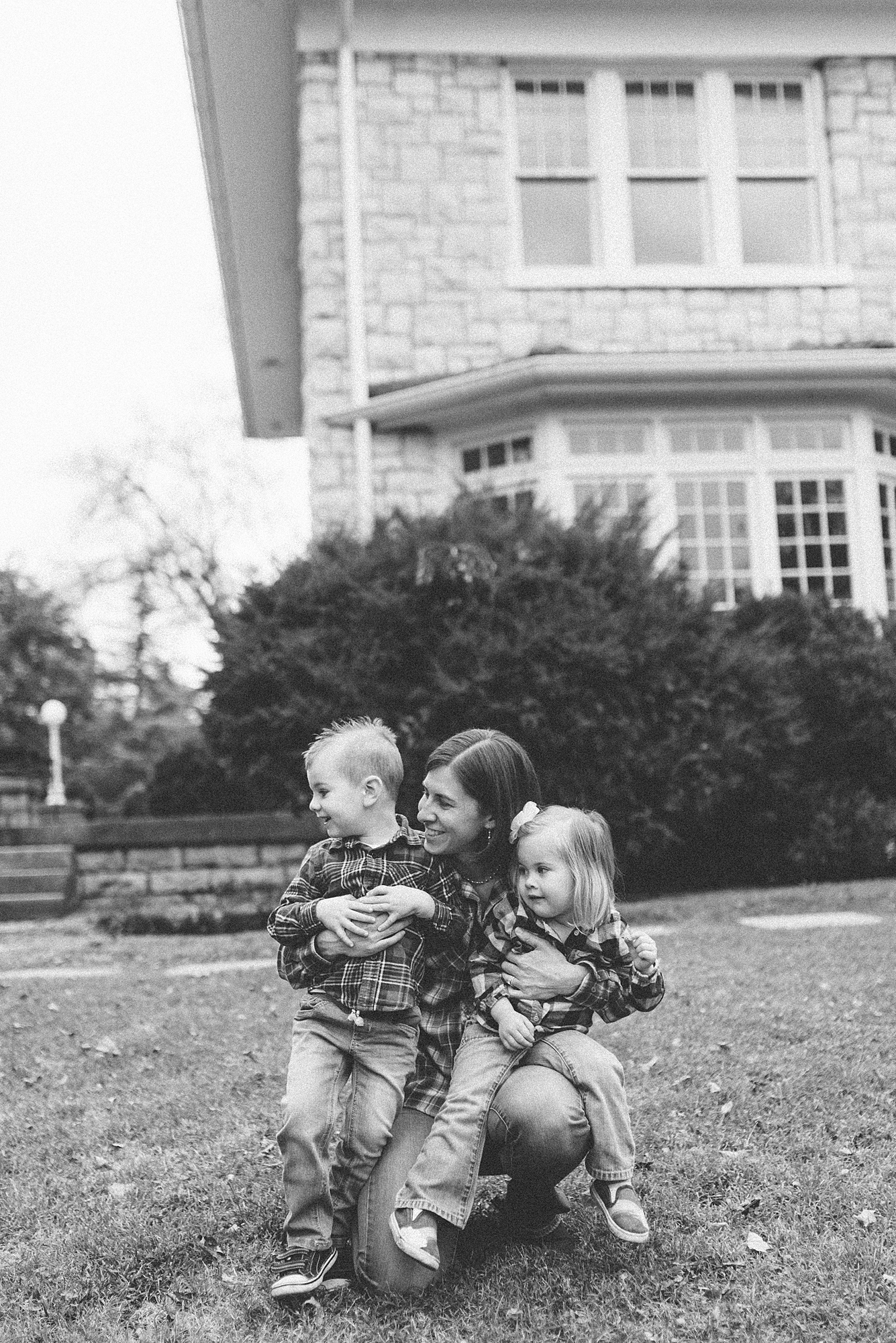 black and white portrait of a mom and her two kids at historic stone hall in Nashville by Nashville Family Photographer Dolly DeLong