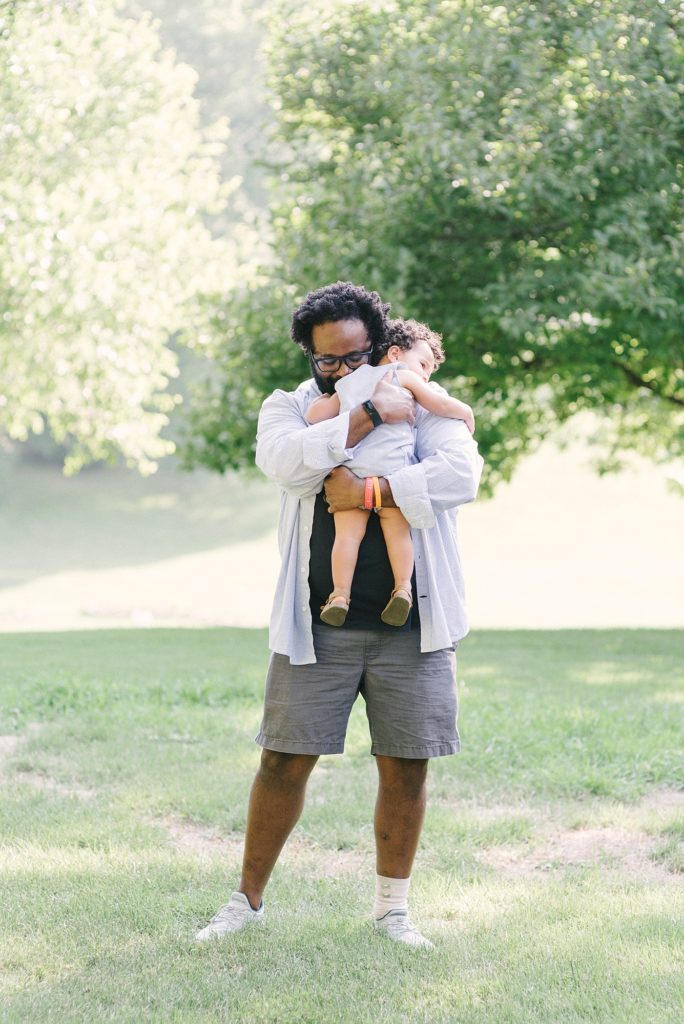 father and son walking in the park at the Nashville Ellington Agricultural Center by Nashville Family Photographer Dolly DeLong