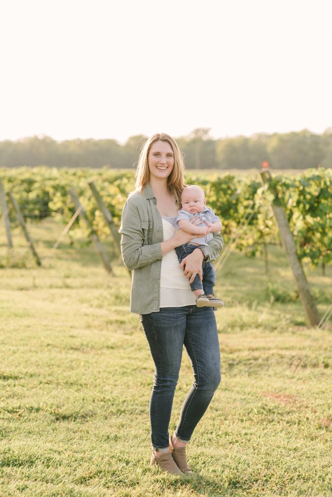A mother holding her son at Arrington Vineyards in Nashville Tennessee With Nashville Family Photographer Dolly DeLong Photography