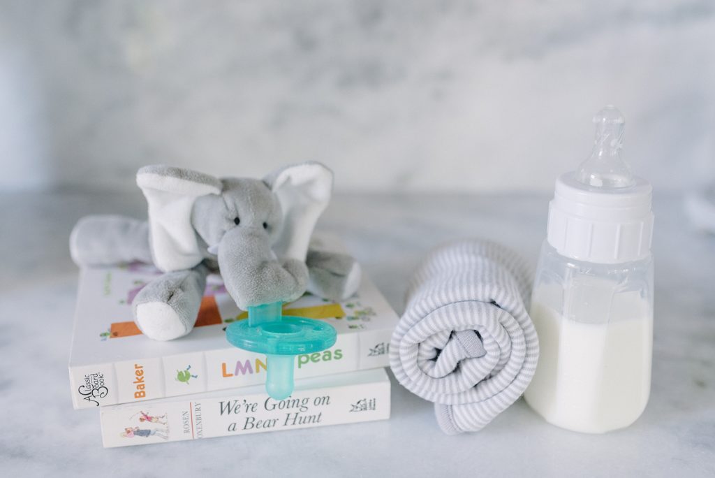 image of a wubbanub elephant and formula in bottle for The Formula Mom by Nashville Branding Photographer Dolly DeLong Photography