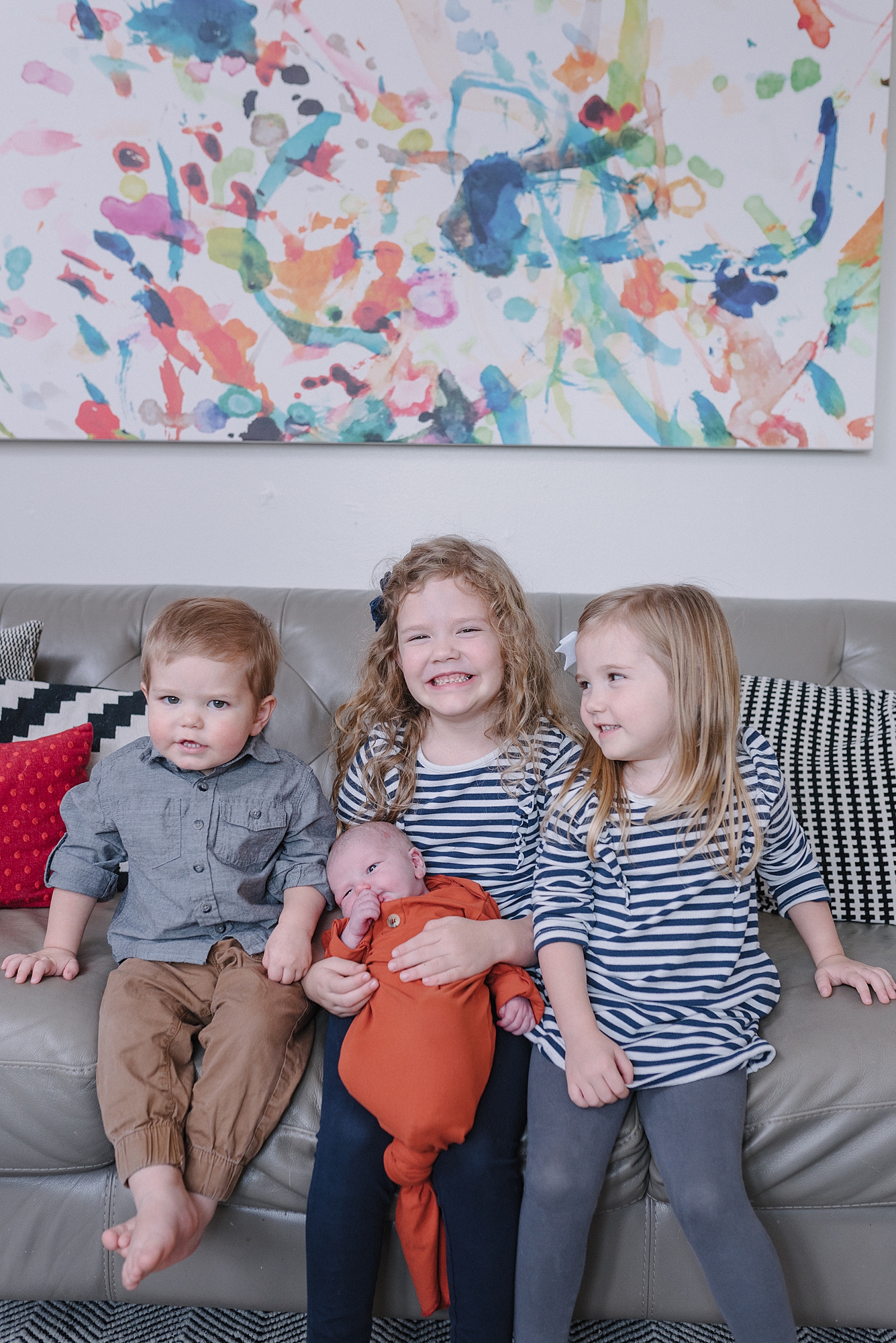 family photos in a living room by Nashville Family photographer Dolly DeLong Photography