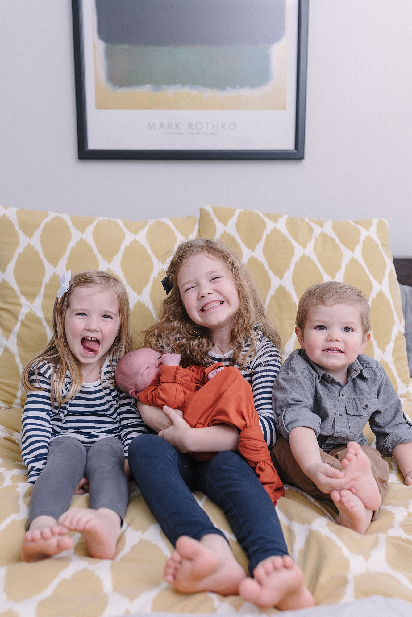 family photos in a living room by Nashville Family photographer Dolly DeLong Photography