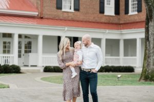 family poses together in Nashville courtyard