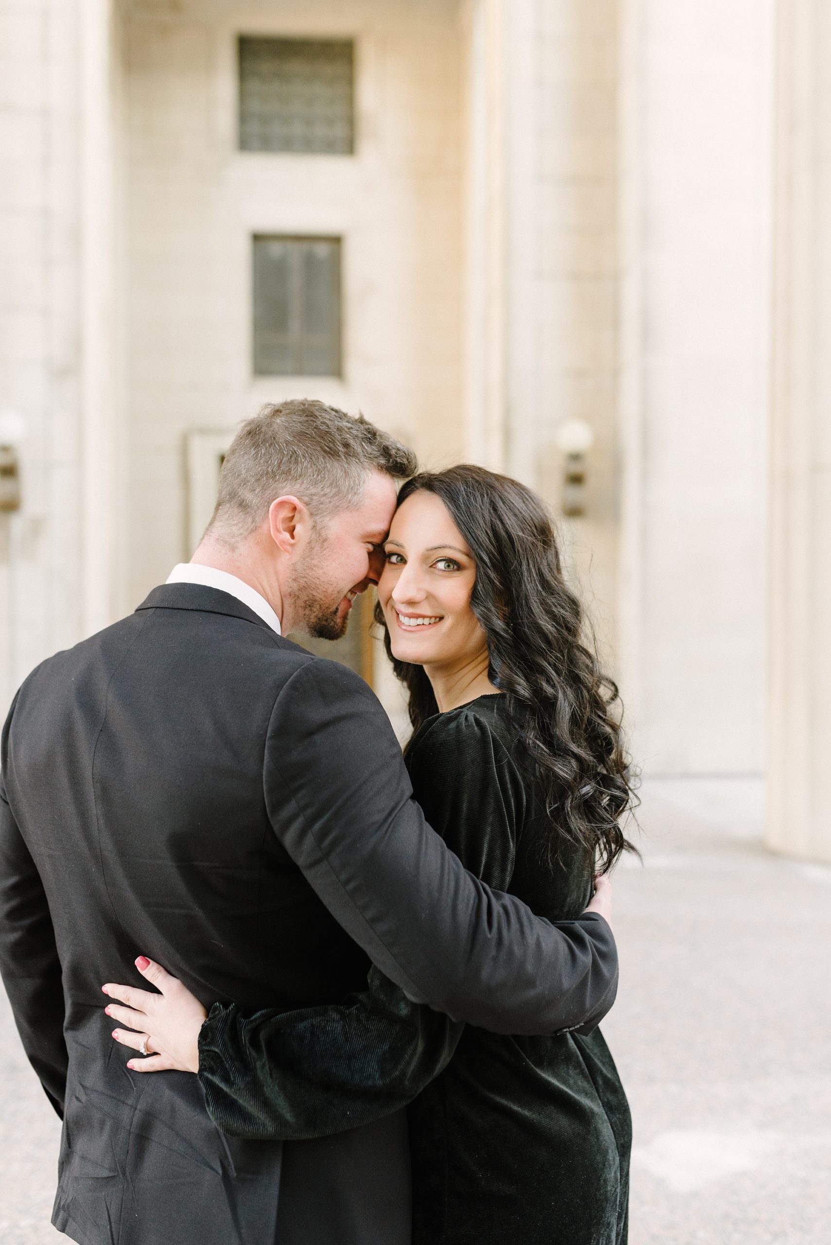 downtown Nashville engagement session with couple touching foreheads