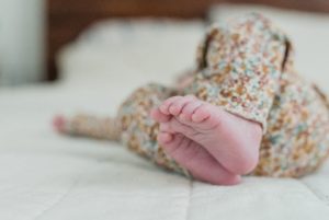 baby's toes curled up during Franklin TN newborn portraits at home
