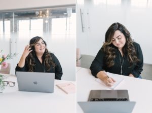 Nashville business owner works on computer during branding photos