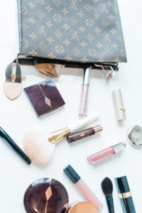 makeup flatlay for business owner