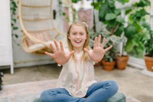 girl shows off 10 fingers for 10th birthday photos in East Nashville Greenhouse