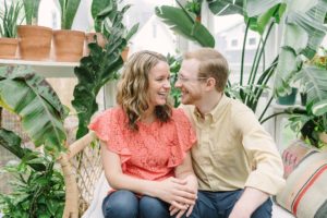 parents laugh together during family portraits in Nashville TN