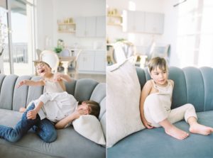 brothers play on couch during Murfreesboro Family Portraits with film photographer