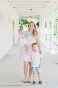 mom pose with two children on front porch during Nashville first birthday portraits