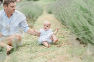 baby sits in field during TN Family photos