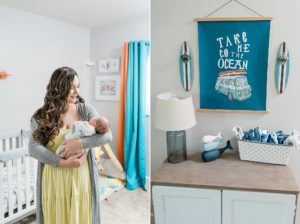 mom looks at baby boy during newborn photos at home in nursery