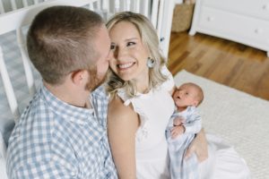 parents look at each other during Nashville newborn portraits
