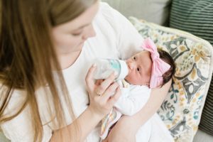 mom feeds daughter during TN newborn photos