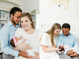 new parents look at baby girl during Nashville newborn session at home
