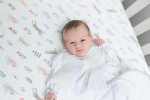 baby girl lays in crib during Franklin TN newborn session