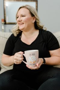 photographer holds mug during Nashville Personal Branding Session