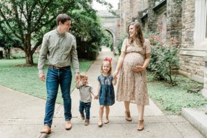 family of four walks during Nashville TN family photos