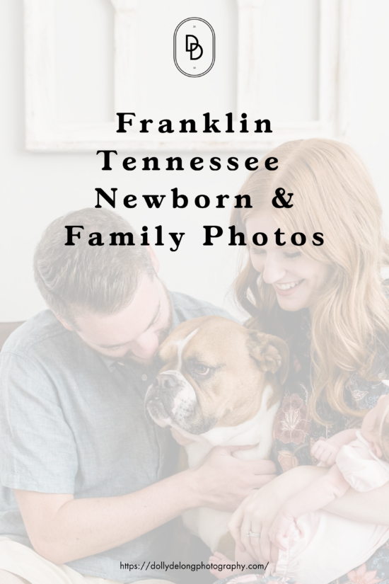 parents sit on couch with daughter and dog during newborn photos at home