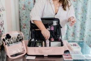 Nashville make up artist puts away makeup bag during branding photos