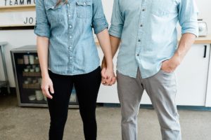 bakers hold hands during Nashville branding photography session