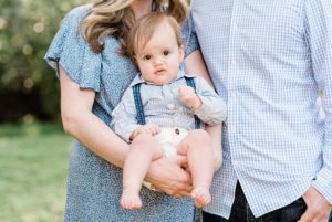 parents hold toddler during TN family photos