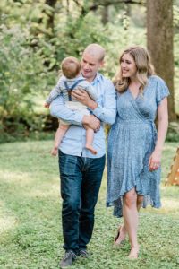 parents walk and talk with son during West Nashville family portraits