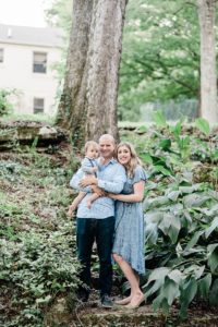 family poses in woods during West Nashville family photos