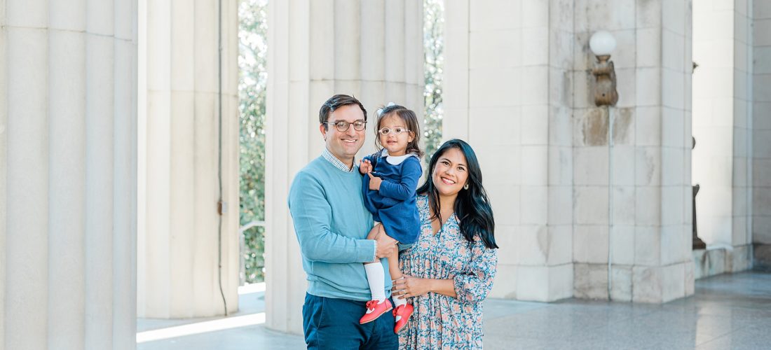 family of three poses together during War Memorial fall mini sessions
