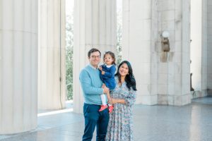 family of three poses together during War Memorial fall mini sessions