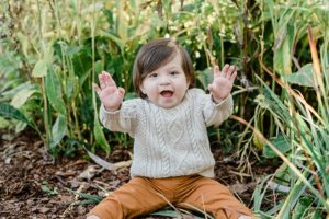 toddler makes funny face during Cheekwood family portraits