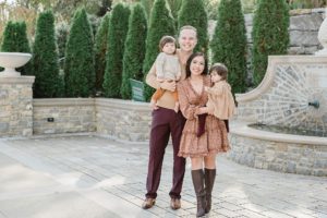 family of four poses together during Cheekwood family portraits