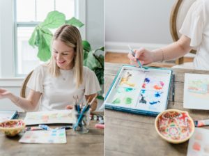 woman paints at dining room table during Nashville branding session