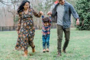 couple swings kid during TN family photos