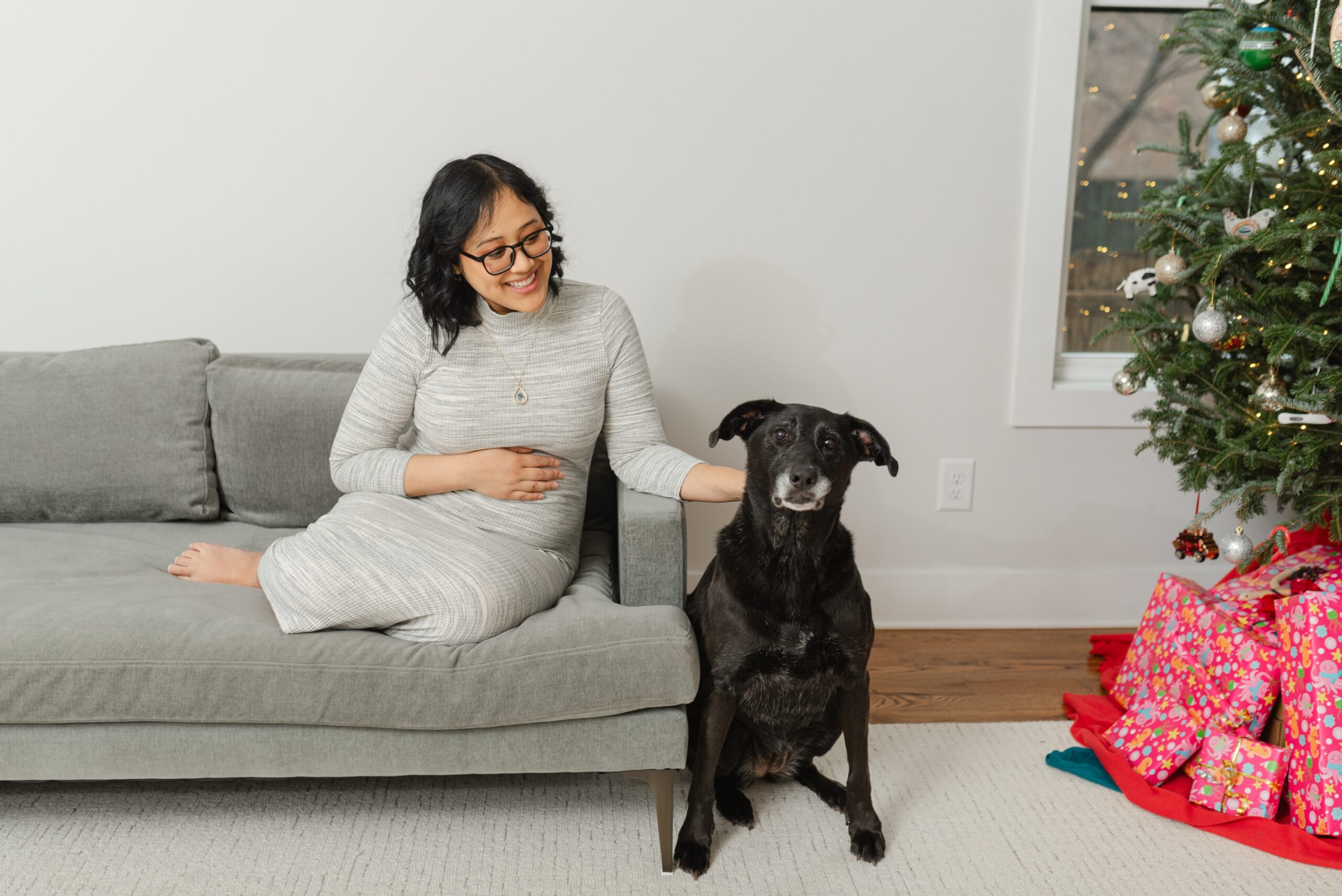 at_home_winter_maternity_photos_by_Nashville_family_photographer_Dolly_DeLong_and_they_include_the_family_pet_Dog