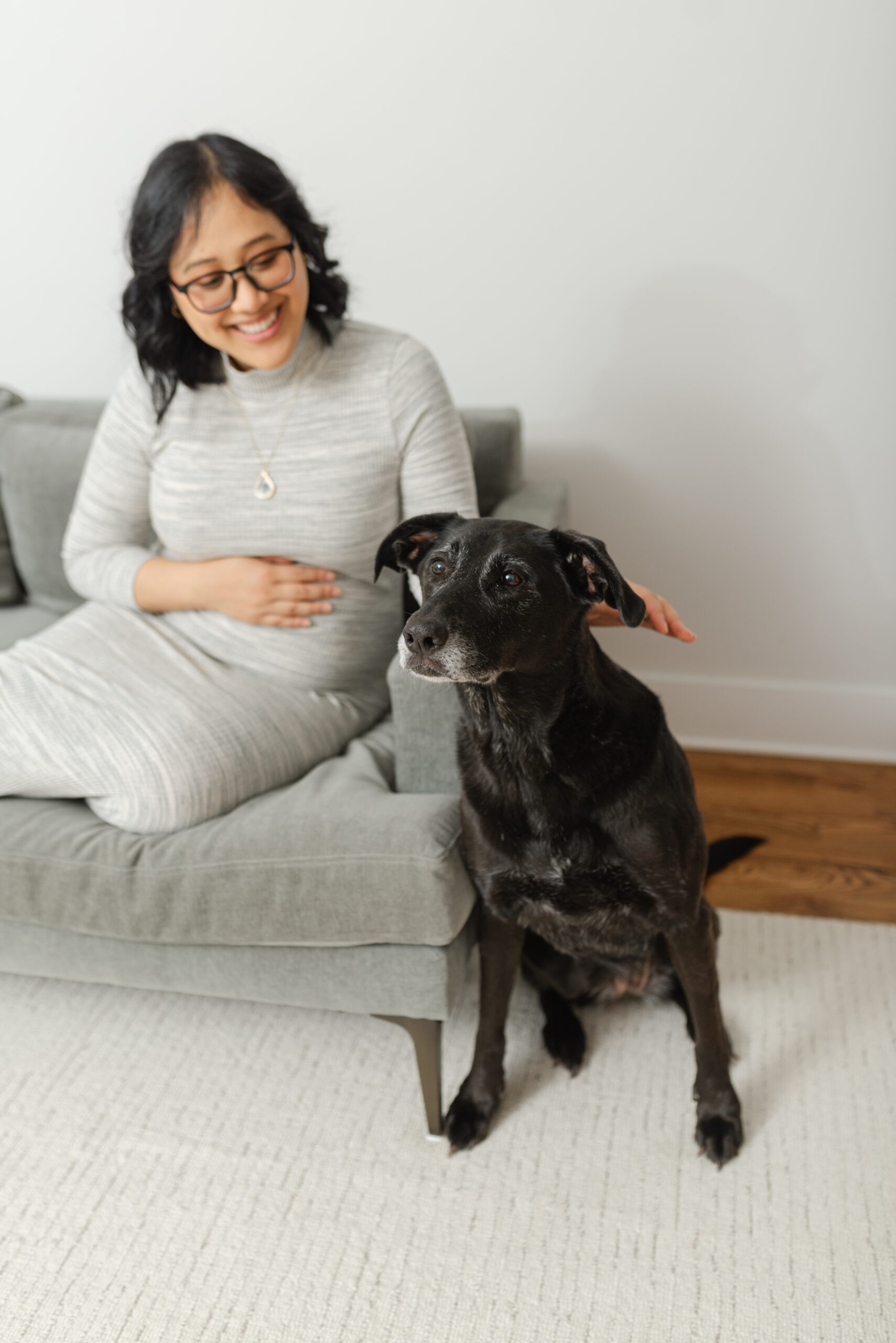 at_home_winter_maternity_photos_by_Nashville_family_photographer_Dolly_DeLong_and_they_include_the_family_pet_Dog