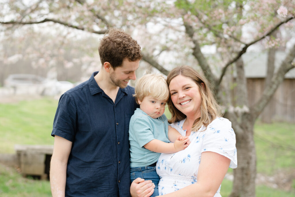 Young couple with baby boy during mini session